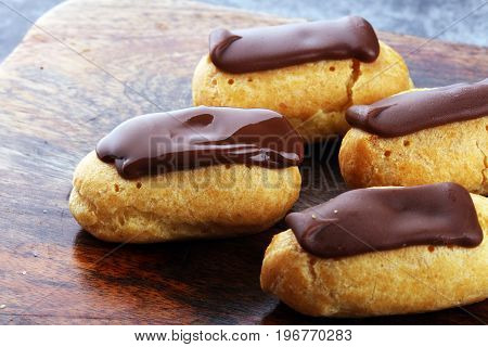 Traditional French Dessert. Eclair With Chocolate Icing. Pastery Concept