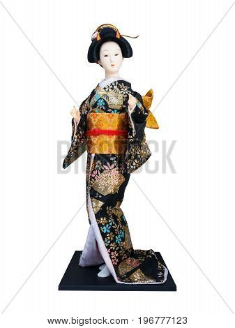 Japanese geisha doll isolated on white background.