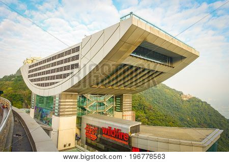 HONG KONG, CHINA - JANUARY 22, 2017: View of the Peak Tower in Hong Kong a top Victoria Peak. At 428 meters above sea level, this iconic landmark features the highest viewing platform in Hong Kong.