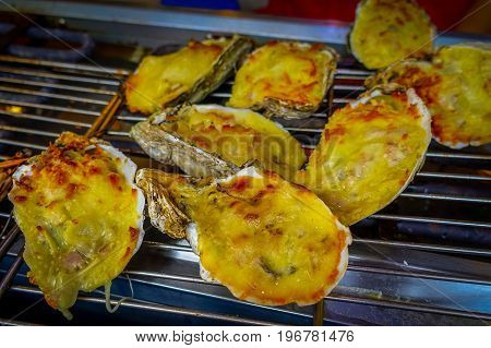 Delicous fresh grilled lobsters, in a market in fishermen town in lantau, Hong Kong, China.