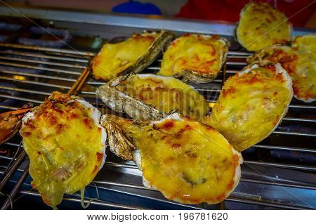 Delicous fresh grilled lobsters, in a market in fishermen town in lantau, Hong Kong, China.