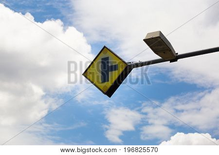 Sign on the road,Symbol of traffic with clouds and blue sky background