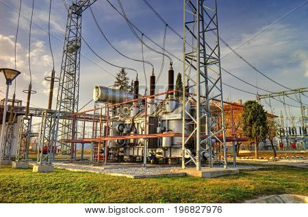 Power transformer in high voltage switchyard in modern electrical substation