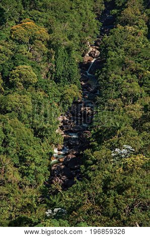 Overview View of hills and covered by forests around a stream in Itatiaia Park, an altitude park, known for its animal diversity, trails and waterfalls. Rio de Janeiro State, southwestern Brazil
