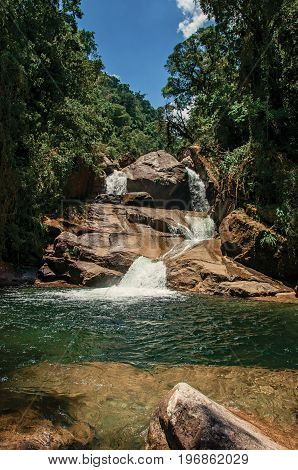 View of small waterfall lagoon in the middle of the forest at the Itatiaia Park, an altitude park, known for its animal diversity, trails and waterfalls. Rio de Janeiro State, southwestern Brazil