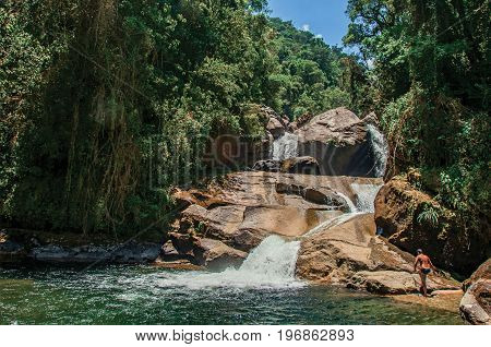 View of small waterfall lagoon in the middle of the forest at the Itatiaia Park, an altitude park, known for its animal diversity, trails and waterfalls. Rio de Janeiro State, southwestern Brazil