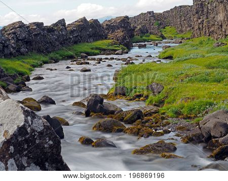 Melted  River In The Thingvellir National Park In Mid-atlantic Ridge