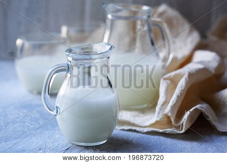 Jugs with serum. Healing product in rustic style