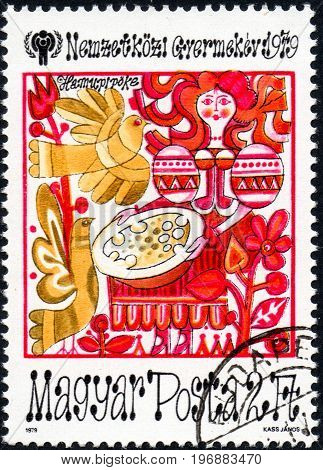 UKRAINE - CIRCA 2017: A postage stamp printed in Hungary shows Fairy Tale Scenes from Cinderella from series International Year of the Child circa 1979