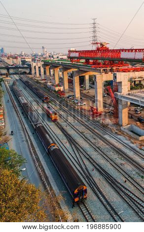 Freight and passenger train waiting at the train station parking lot.Cargo transit.import export and business logistic.Aerial view.Top view.Railway construction