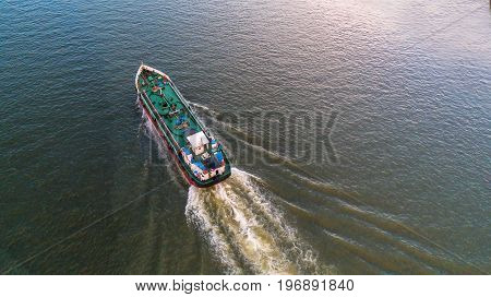 oil tanker gas tanker in the high sea.Refinery Industry cargo ship. top viewaerial viewThailand in import export LPGoil refinery Logistics and transportation with working crane bridge in harbor