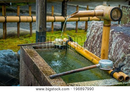 KYOTO, JAPAN - JULY 05, 2017: Gorgeous small pond at Tenryu-ji Temple, in Kyoto, Japan