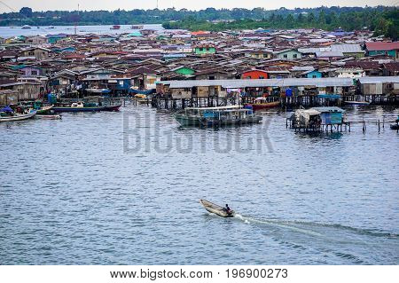 Semporna,Sabah,Malaysia-Apr 22,2017:View of Semporna bajau water village in Semporna,Sabah,Malaysia.The water village is a popular tourist attraction place in Semporna,Sabah,Borneo,Malaysia