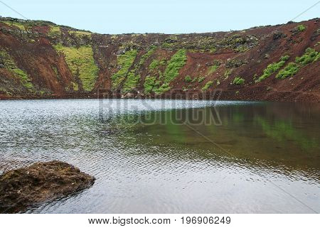 Kerid is a volcanic crater lake located in the Grimsnes area in south Iceland on the popular tourist route the Golden Circle.
