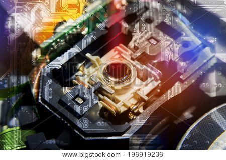 Close up macro Laser Head reader of cd player system equipment installed on electronics circuit board Double Exposure Circuit board pattern illustration design Electronics equipment concept.