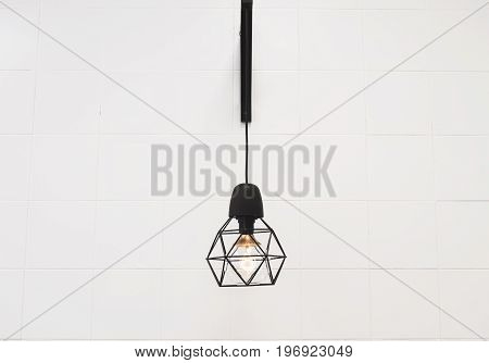 Minimalist lamp in the middle of a wall