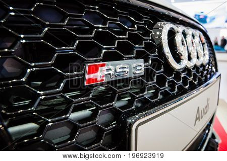 BERLIN - MAY 02 2015: Showroom. The emblem of Hot hatch Audi RS3 (8VA). Produced since 2015.