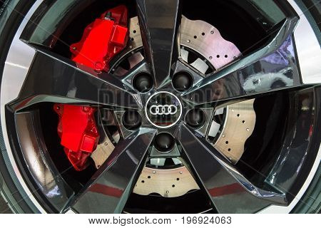 BERLIN - MAY 02 2015: Showroom. Wheels and braking system components of a hot hatch Audi RS3 (8VA). Produced since 2015.