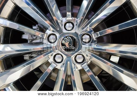 BERLIN - MAY 02 2015: Showroom. Wheels and braking system of a large family car Skoda Superb (Third generation). Produced since 2015.