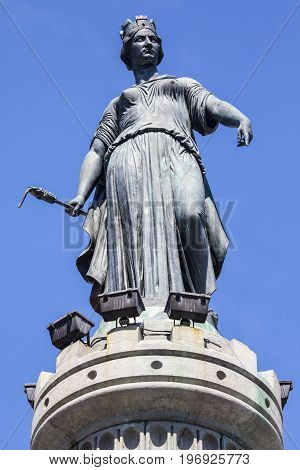 The magnificent statue ontop of the Column of the Goddess situated in Grand Place - the central square in the historic city of Lille in France.