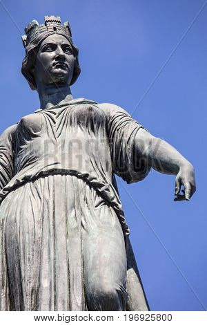 The magnificent statue ontop of the Column of the Goddess situated in Grand Place - the central square in the historic city of Lille in France.