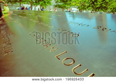 NEW YORK, USA - NOVEMBER 22, 2016: Text close up on Memorial 9-11 monument in Manhattan after the attempted against twin towers in new York Usa.