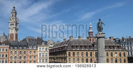 View in Grand Place in the historical city of Lille France. The view includes the Column of the Goddess Vieille Bourse and the Chamber of Commerce and Industry.