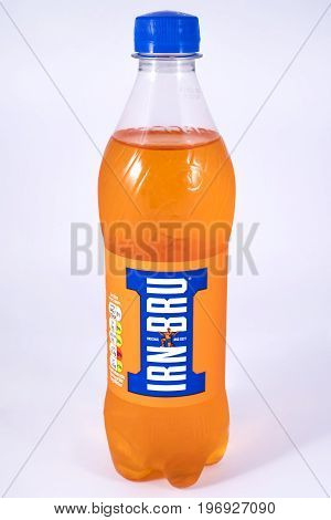 LONDON UK - JULY 7TH 2017: An unopened bottle of Irn-Bru over a plain white background on 7th July 2017.