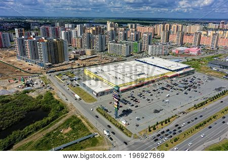 Tyumen, Russia - June 13, 2017: Aerial view onto Zeleniy Bereg shopping center and European residential district