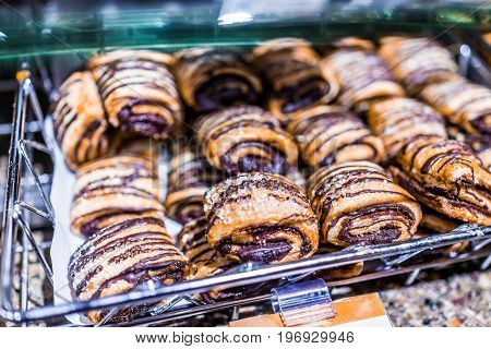Chocolate roll pastry macro closeup on display