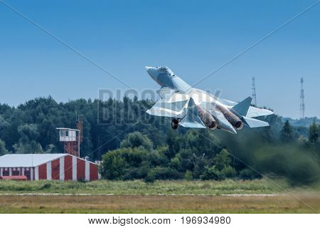 Moscow Region - July 21, 2017: New Russian fifth-generation fighter T-50 (Sukhoi PAK FA) takes off at the International Aviation and Space Salon (MAKS) in Zhukovsky.