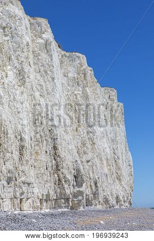 The beautiful chalk cliffs along the coastline in East Sussex in the UK.