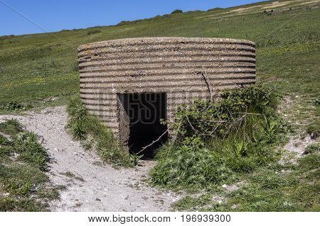 A panoramic view showing World War II defences at the estuary in Cuckmere Haven situated in the Seven Sisters Country Park in East Sussex UK.