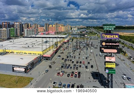 Tyumen, Russia - June 13, 2017: Aerial view onto Zeleniy Bereg shopping center and European residential district