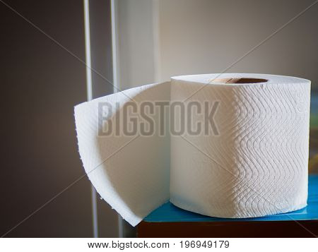 (Close up) Toilet paper on wood background health and sanitation.