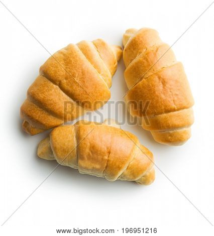 Tasty buttery croissants isolated on white background.