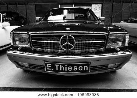 BERLIN - MAY 10 2015: Full-size luxury car Mercedes-Benz 560 SEC (C126) 1991. Black and white. 28th Berlin-Brandenburg Oldtimer Day
