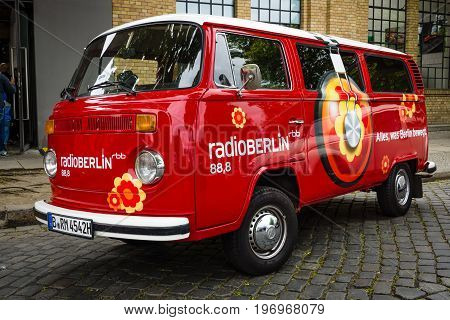 BERLIN - MAY 10 2015: Minibus Volkswagen Type 2 (T2) with radio station advertising RadioBerlin. 28th Berlin-Brandenburg Oldtimer Day