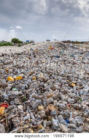 plastic waste dumping landfill site and open burning area