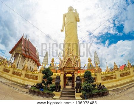 Roiet Thailand - Aug 23 2016 : The Tallest standing Buddha image in Thailand and The Sixth in the world with it's 67.8m tall at Burapapiram Temple