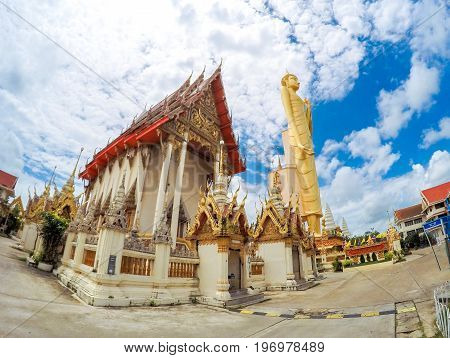 Roiet Thailand - Aug 23 2016 : The Tallest standing Buddha image in Thailand and The Sixth in the world with it's 67.8m tall at Burapapiram Temple