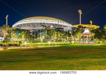 Adelaide Australia - April 16 2017: Adelaide Oval with Elder Park Rotunda illuminated at night time
