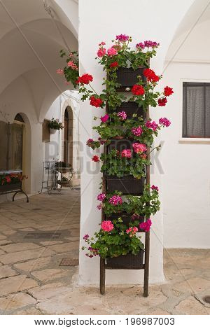 Characteristic alleyway of Locorotondo. Puglia. Southern Italy.