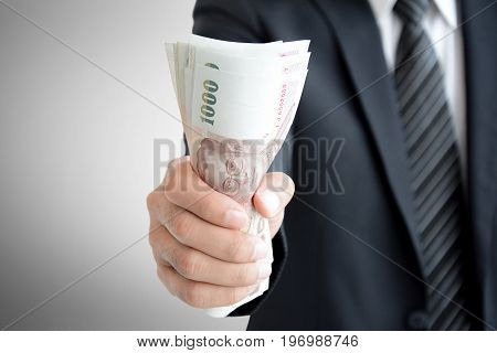 Businessman Hand Grabbing Money Thai Baht (thb)