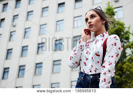 Closeup Fashion Portrait Of Young Pretty Hipster Girl With Dark Brown Hairs Wearing Stylish Denim Br