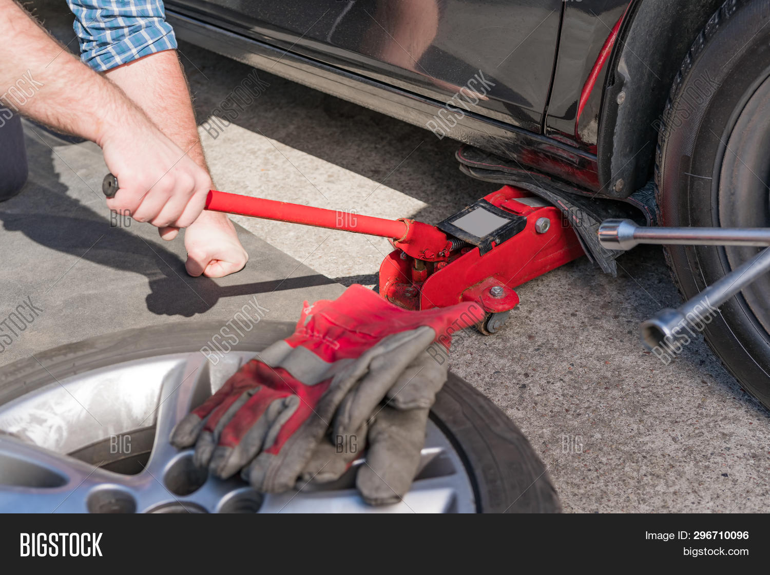 Man Jacking Car On Image & Photo (Free Trial) Bigstock