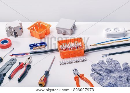 Electrical Connectors With Wires, Junction Box And Different Materials Used For Jobs In Electricity.