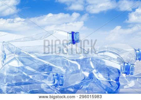 Recycle Waste Plastic Bottles Against Sky For Sustainable Development, Environmental Background. Eco