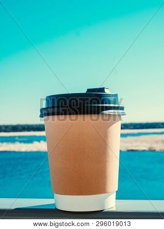 Paper Cup Of Coffee On Natural Morning Background. Film Effect.