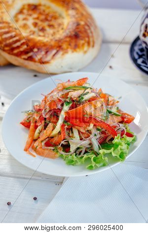 Vegetable Salad On The White Plate, Great Image For Your Needs. Achik Chukchuk Salad With Tomatoes A